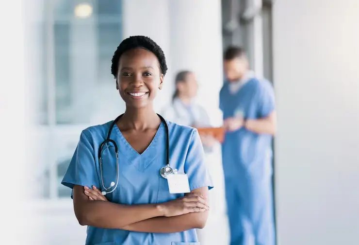 happy-nurse-portrait-black-woman-with-arms-crossed-hospital-healthcare